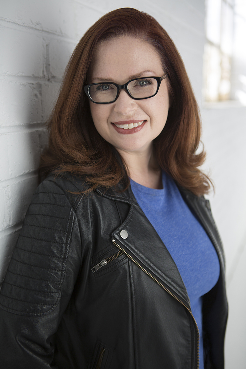 Headshot photo of Cassandra O'Leary, Author by Say Heidi Photography